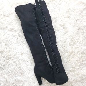 Thigh high lace up boots